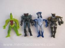 Four Early 1990s Action Figures including VR Troopers Tankotron and Power Rangers Villains Evil