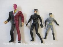 Three DC Comics Action Figures including Cat Woman and Two Face, 3 oz