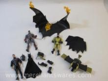 Two Batman Action Figures and Accessories including Quick Change Batman and Tec-Shield Batman, see