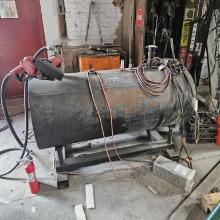Fuel tank on skid with pump