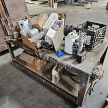Rolling cart with assorted filters, chemicles,