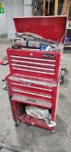 G standard tool box filled with assorted tooling,