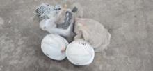 Lot of safety equipment, hard hats, knee pads,
