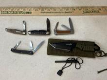 5 knives including 4 pocket knives and 1 survivor knife