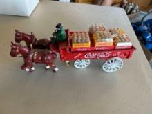 Vintage cast iron Coca Cola horse drawn wagon with pop cases included.... Nice!!......Shipping