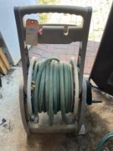 Garden Hose and Mobile Reel. NO SHIPPING AVAILABLE ON THIS LOT!