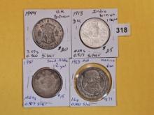 Four silver World coins