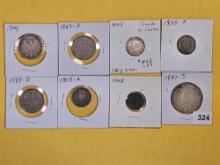 Eight mixed World Coins