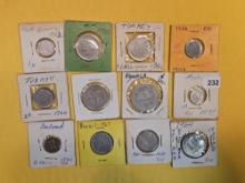 Twelve mixed World coins