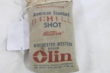 One sewn 5 Lb canvas bag of #9 shot. Unopened.