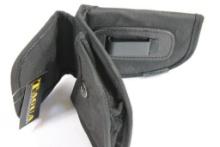 One Tagus black nylon dual clip right handed holster. In package.