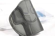 One Tagua 1836 black leather right handed clip holster for Glock 19, 23, 32 and similar frames. In