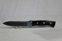 Arkansas Made Dozier Sheath knife with 6 inch blade. Dark Micarta scales. D2 steel. No sheath. Used