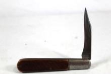 Remington Barlow with 3.5 inch blade. An older knife that has had the tip broken and has been