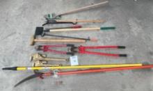 LOT OF PIPE WRENCHES, BOLT CUTTERS, TRIMMER, SLEDGE HAMMER, CROW BAR, ETC.