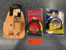 TAPE MEASURE HOLDER AND TAPE MEASURES