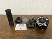 Group of several antique telephone caps, Kellogg candlestick shaft, and WE dial