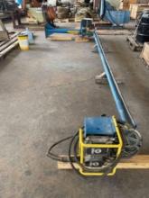 Welding Boom equips with Miller 70 Series wire feeder and Miller Delta 651 MiG welder