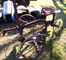 Ride on horse drawn turning plow