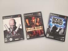 Sony Playstation 2 Video Games: Hitman, Pirates of the Caribbean, Rock Band