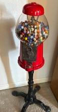 Black and red pedestal bubble gum, machine with marbles