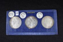3 - Morgan Dollars including 1879, 1879-O, and 1879-S; All AU; 3xBid