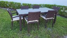 BRAND NEW OUTDOOR Brown Synthetic Wicker 63" x 35" Table With Glass Top and 6 Stacking  Chairs