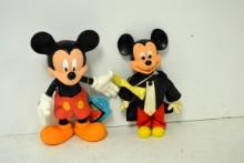 2 plastic Mickey Mouse dolls