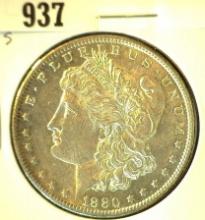 1880 S Morgan Silver Dollar, Almost Uncirculated.