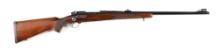 (C) PRE-64 WINCHESTER MODEL 70 BOLT ACTION RIFLE IN .375 H&H MAGNUM (1951).