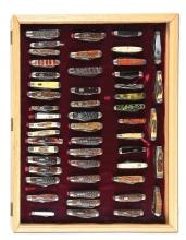 CASED COLLECTION OF 51 AMERICAN FOLDING KNIVES.