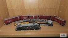 Lot of Lionel Hallmark locomotives and box car ornaments