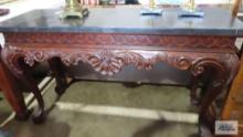 Cherry finish sofa table with marble finish top