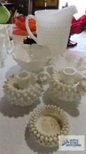 Lot of milk glass hobnail candle holders, footed candy dish, fluted candy dish and hobnail pitcher