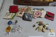 Religious jewelry including pins and pendants