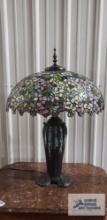 Reproduction Tiffany lamp. 30 in. tall, base...of glass is 20 in. wide