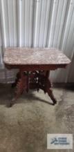 Antique stand with marble top. 29 in. tall by 32 in. wide 23 in. deep