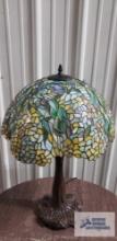 Reproduction Tiffany lamp. 20 in. tall, Base of glass is 17 in. wide