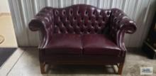 Faux leather loveseat made by Distinction Furniture Corp.