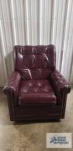 Faux leather armchair made by Distinction Furniture Corp.