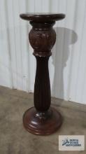 Carved wood...pedestal. 35 in. tall by 11-1/2 in. round