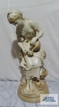 Marwal chalkware statue of girl with water jug. approximately 30-1/2 in. tall.