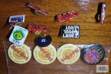 Hard Rock Cafe and assorted sports pins
