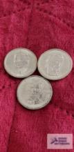 Millard Fillmore, James K. Polk, and Abraham Lincoln presidential one dollar coins