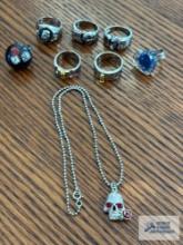 Costume jewelry skull rings and necklace and other rings