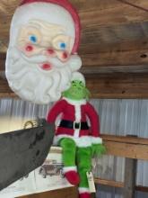 Hanging Plastic Santa Head w/ Stuffed Grinch Doll