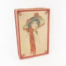 Antique cardboard box with lady
