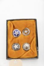 Collection of four miniature Texas Law Enforcement Badges measuring from 1" in diameter to 3/4" in d