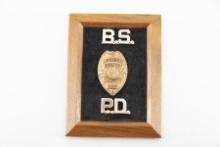Gold Shield Badge with raised porcelain letters marked "Chief of Police / Big Spring, Texas" 1 1/2"