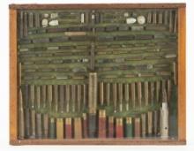 Collection of antique Ammunition in shadow box frame. Approximately 100 Shells and Cartridges, inclu